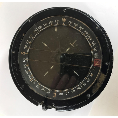 672 - A SECOND WORLD WAR AEROPLANE COMPASS. A Type P8 compass with stamped No. 87309 H. 14cm wide.