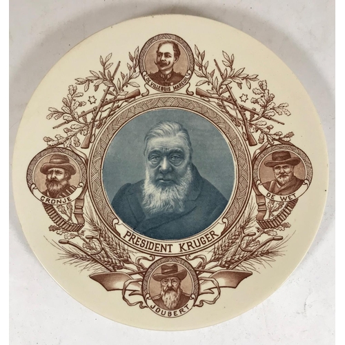 680 - A RARE SARREGUEMINES 'KRUGER' PLATE. A pottery plate decorated with a central portrait of President ... 