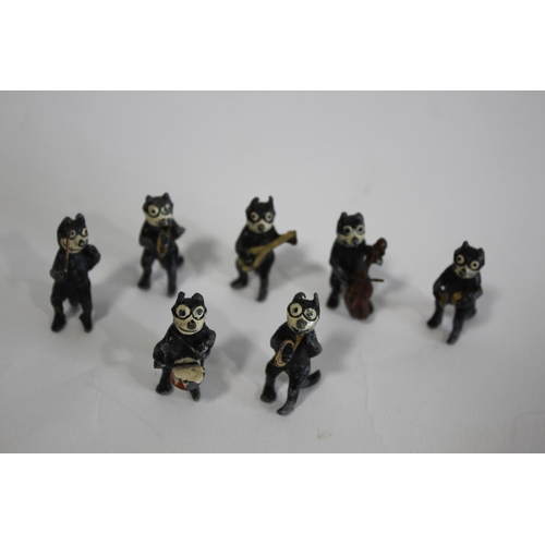 1377 - FELIX THE CAT - PAINTED MUSICAL BAND a collection of 7 painted metal figures, with depictions of Fel... 