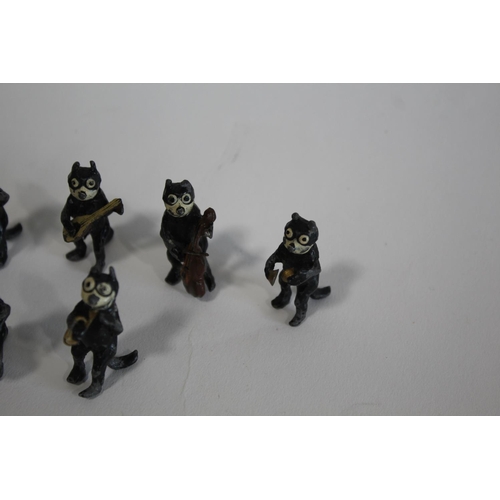 1377 - FELIX THE CAT - PAINTED MUSICAL BAND a collection of 7 painted metal figures, with depictions of Fel... 