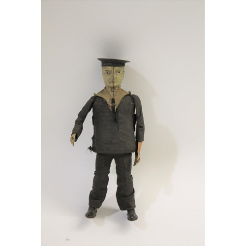 1407 - LEHMANN CLOCKWORK FIGURE - SAILOR a early 20thc tin plate clockwork figure of a Sailor which rocks f... 