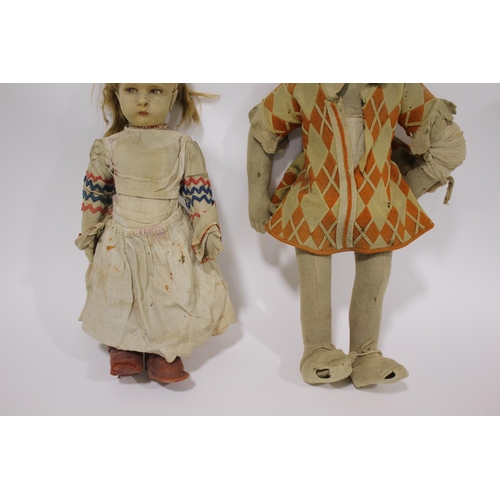 1477 - ANTIQUE DOLLS possibly by Kathe Kruse, including a large doll with a check coloured outfit and pair ... 