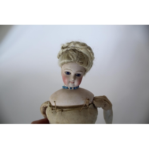 1509 - 19THC FRENCH FASHION DOLL HEAD the doll with a small bisque head with fixed blue glass eyes, with a ... 