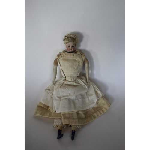 1509 - 19THC FRENCH FASHION DOLL HEAD the doll with a small bisque head with fixed blue glass eyes, with a ... 