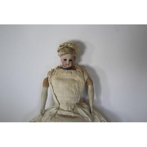 1509 - 19THC FRENCH FASHION DOLL HEAD the doll with a small bisque head with fixed blue glass eyes, with a ... 