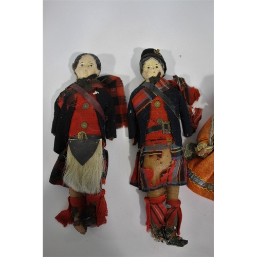 1515 - 19THC PAPIER MACHE DOLLS 2 similar papier mache head dolls with tartan costumes (some damages), a 19... 