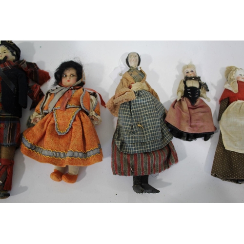 1515 - 19THC PAPIER MACHE DOLLS 2 similar papier mache head dolls with tartan costumes (some damages), a 19... 