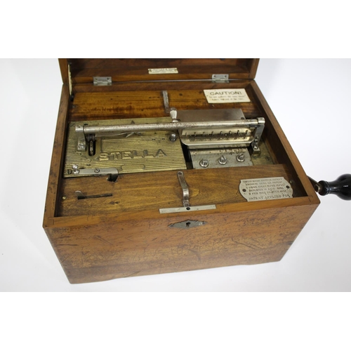 1531 - 'STELLA' SWISS MUSIC BOX DISC PLAYER a double comb music box marked Stella, 20276, with a patent pla... 