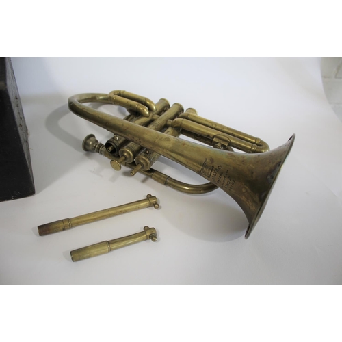 1549 - CASED BOOSEY & CO CORNET & PHOTOGRAPH a brass Boosey & Co brass cornet, Serial No 20702 and with a m... 