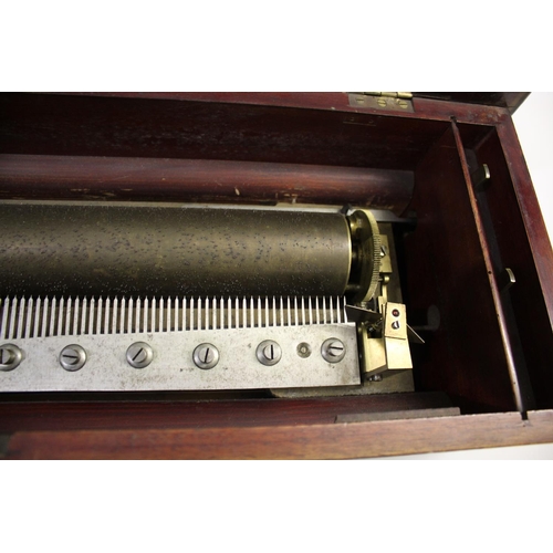 1551 - VICTORIAN MUSICAL BOX with a 35cms long cylinder and stop/start and change/repeat levers on one side... 