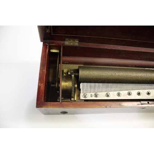 1551 - VICTORIAN MUSICAL BOX with a 35cms long cylinder and stop/start and change/repeat levers on one side... 