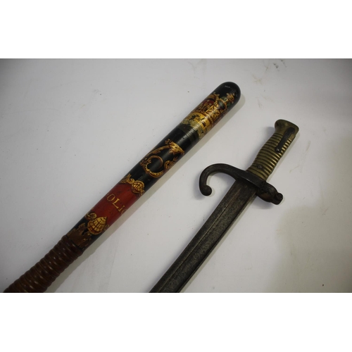 1623 - VICTORIAN POLICE TRUNCHEON the painted truncheon with VR monogram and marked Police, with a ring tur... 