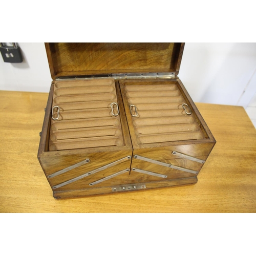 1632 - CIGAR HUMIDOR a large cigar humidor, the outer case made in walnut with a hinged lid and metal carry... 