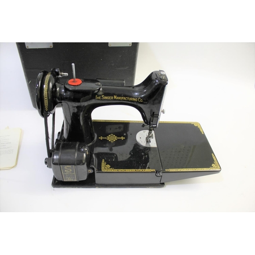 1641 - SINGER SEWING MACHINE - 221K a folding portable Singer 221K sewing machine, in its case and with it'... 