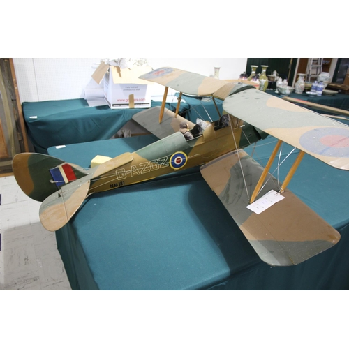 1660 - LARGE MODEL AEROPLANE a large model of a Bi-Plane, fitted with a small ASP engine and with various e... 