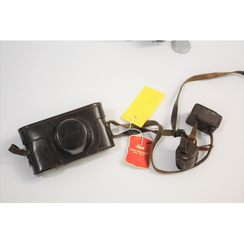 1681 - LEICA CASED CAMERA a Leica IIIf rangefinder camera, Serial Number 687691 (1954) and with a Leitz Sum... 