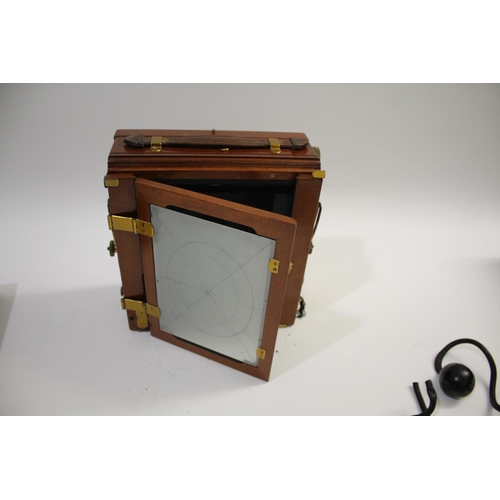 1702 - SANDERSON PLATE CAMERA a mahogany plate camera with a Beck Symmetrical Lens (leather cap with paper ... 