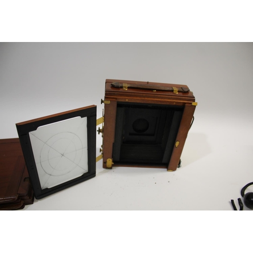 1702 - SANDERSON PLATE CAMERA a mahogany plate camera with a Beck Symmetrical Lens (leather cap with paper ... 