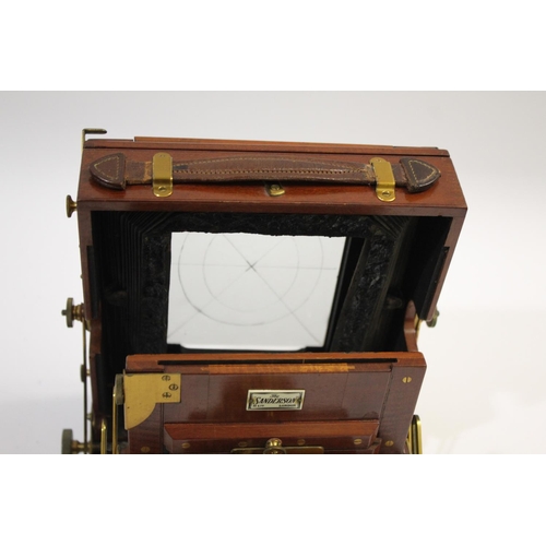 1702 - SANDERSON PLATE CAMERA a mahogany plate camera with a Beck Symmetrical Lens (leather cap with paper ... 