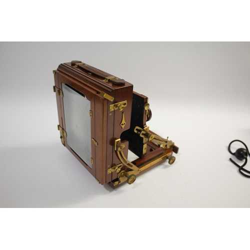 1702 - SANDERSON PLATE CAMERA a mahogany plate camera with a Beck Symmetrical Lens (leather cap with paper ... 