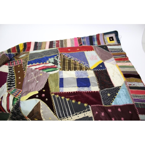 1755 - CRAZY PATCHWORK QUILT - AMERICAN a large patchwork quilt, the centre with a large selection of silk ... 