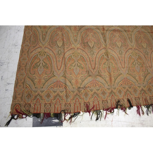 1756 - 19THC PAISLEY SHAWL probably late 19thc, the silk shawl with a Paisley design and a coloured fringe ... 