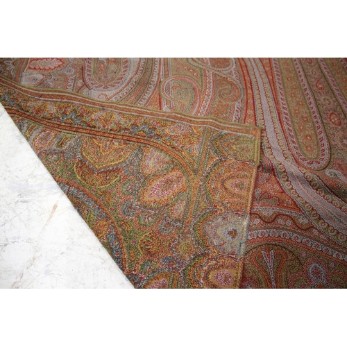 1757 - 19THC PAISLEY SHAWL probably late 19thc, a large Paisley patterned woollen shawl with the remains of... 