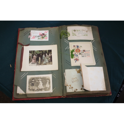 1343 - POSTCARD ALBUMS including 3 albums with vintage greetings and remembrance cards, a large scrap album... 