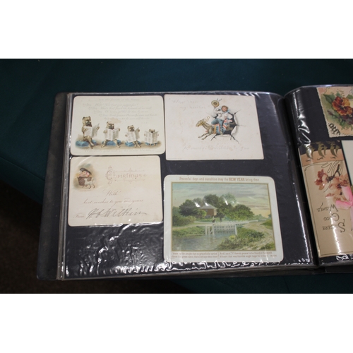 1343 - POSTCARD ALBUMS including 3 albums with vintage greetings and remembrance cards, a large scrap album... 