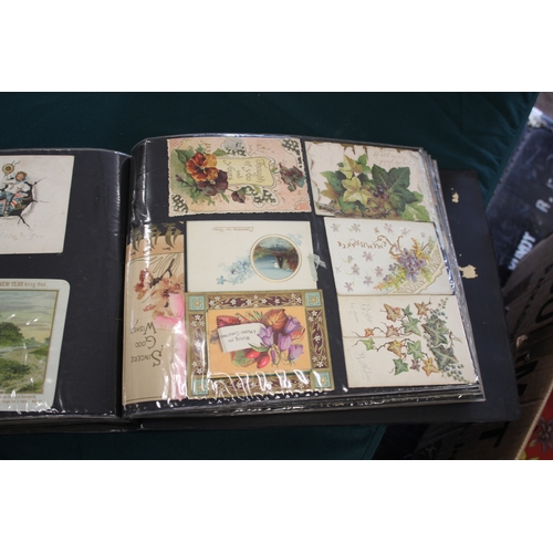 1343 - POSTCARD ALBUMS including 3 albums with vintage greetings and remembrance cards, a large scrap album... 