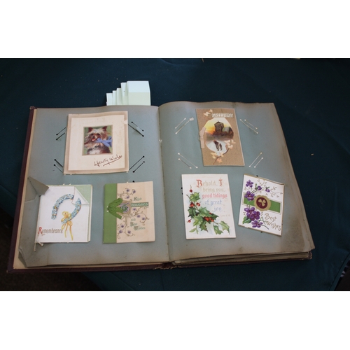 1343 - POSTCARD ALBUMS including 3 albums with vintage greetings and remembrance cards, a large scrap album... 