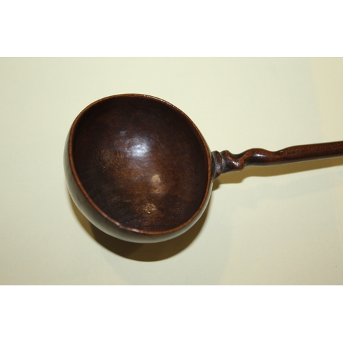 1653 - TREEN LADLES probably both 19thc and made in fruitwood, one spoon with a straight shaft and ovoid bo... 