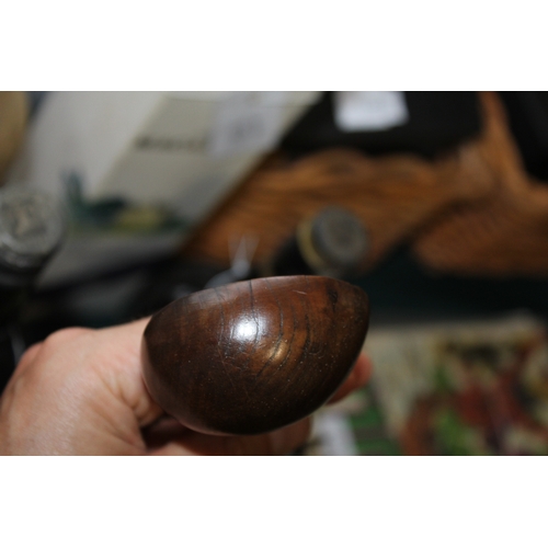 1653 - TREEN LADLES probably both 19thc and made in fruitwood, one spoon with a straight shaft and ovoid bo... 