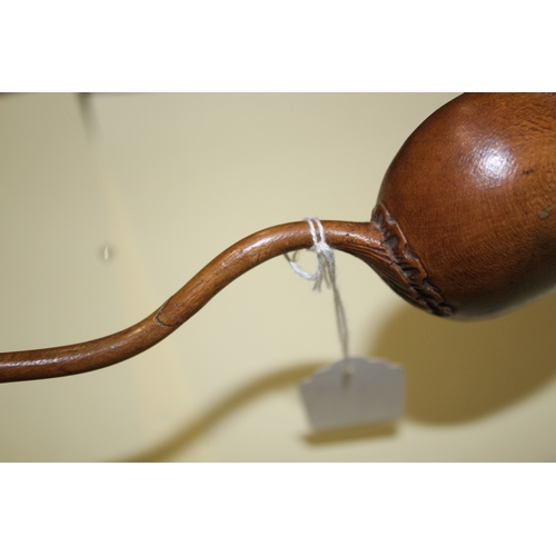 1653 - TREEN LADLES probably both 19thc and made in fruitwood, one spoon with a straight shaft and ovoid bo... 