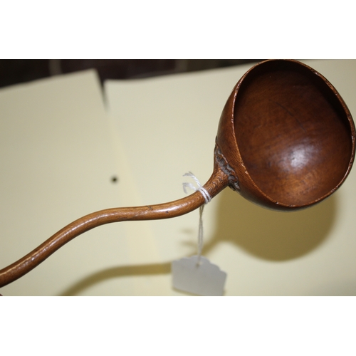 1653 - TREEN LADLES probably both 19thc and made in fruitwood, one spoon with a straight shaft and ovoid bo... 