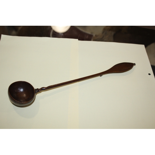 1653 - TREEN LADLES probably both 19thc and made in fruitwood, one spoon with a straight shaft and ovoid bo... 