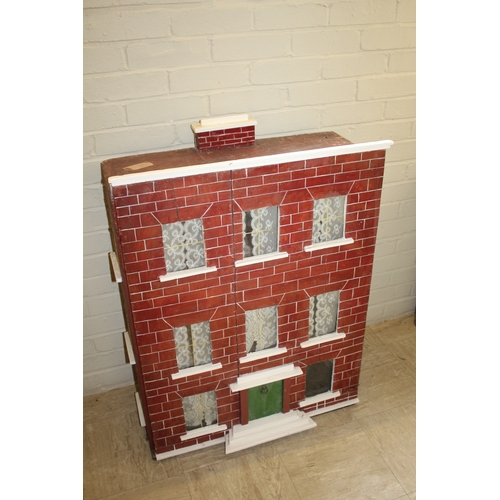 1473 - VICTORIAN DOLLS HOUSE a 3 storey pine house with painted brick facade, and glazed windows with netti... 