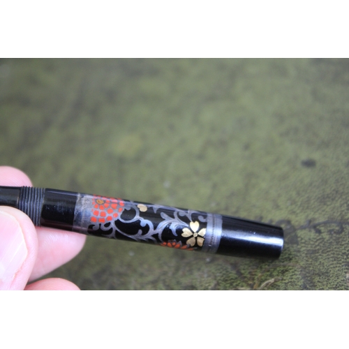 1559 - RARE NAMIKI FOUNTAIN PEN a silver and lacquered fountain pen with lever filler, the lid and barrel w... 