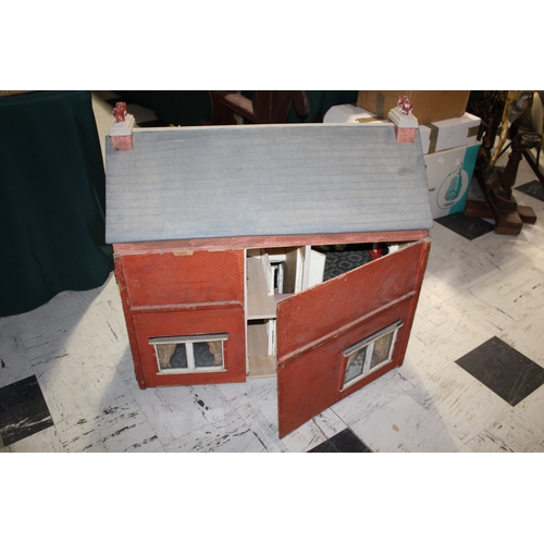 1481 - ANTIQUE DOLLS HOUSE a 2 storey house with large glazed windows and brick facade, the interior with f... 