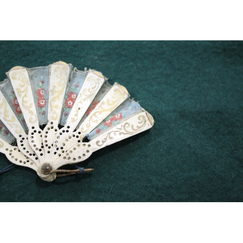 1505 - 19THC DOLLS FAN a fabric and bone miniature fan, with pierced bone brise sections with gold painted ... 