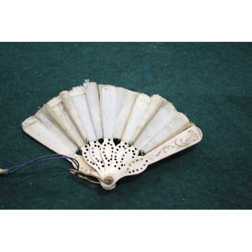 1505 - 19THC DOLLS FAN a fabric and bone miniature fan, with pierced bone brise sections with gold painted ... 