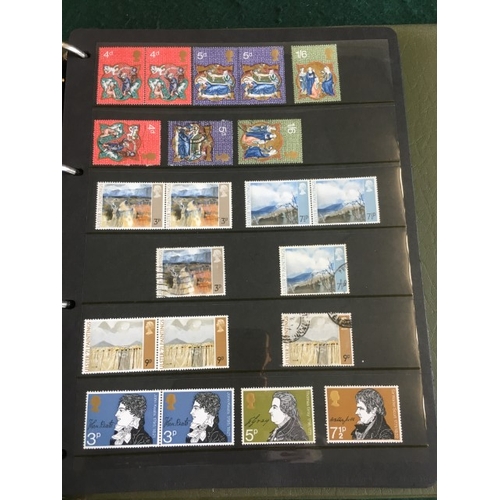 1300 - GREAT BRITAIN STAMP ALBUMS including an album with QE 11 mint and used examples (including £1 stamps... 