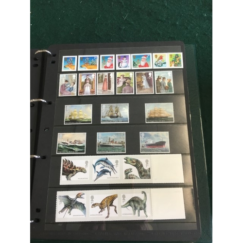 1300 - GREAT BRITAIN STAMP ALBUMS including an album with QE 11 mint and used examples (including £1 stamps... 