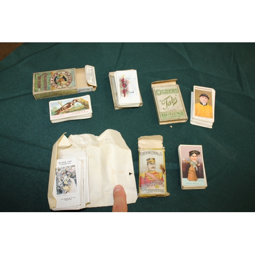 1330 - CIGARETTE CARDS in albums and in packets, including John Player Cricketers Caricatures, John Players... 