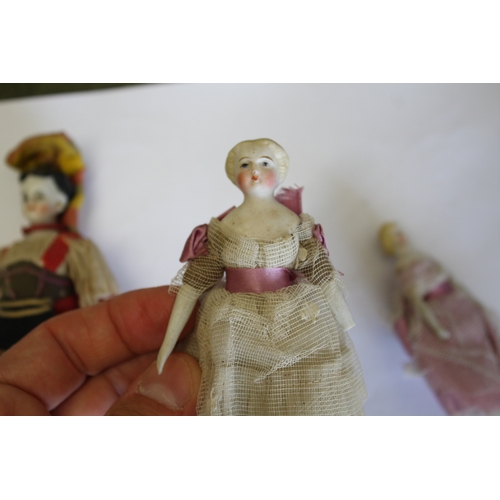 1511 - COLLECTION OF MINIATURE DOLLS a collection of miniature dolls including bisque head, parian, and chi... 