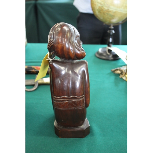 1629 - TRIBAL FIGURE - BALI, 1938 a carved hardwood figure of a lady, the figure in a seated pose and with ... 