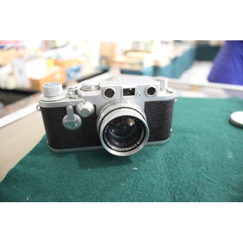 1681 - LEICA CASED CAMERA a Leica IIIf rangefinder camera, Serial Number 687691 (1954) and with a Leitz Sum... 