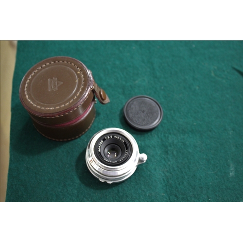 1681 - LEICA CASED CAMERA a Leica IIIf rangefinder camera, Serial Number 687691 (1954) and with a Leitz Sum... 