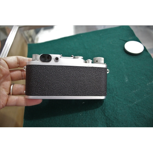 1681 - LEICA CASED CAMERA a Leica IIIf rangefinder camera, Serial Number 687691 (1954) and with a Leitz Sum... 