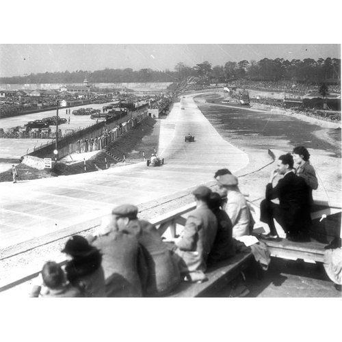 809 - Brooklands.  A folder with a good selection of both promotional postcards and half-plate monochrome ... 